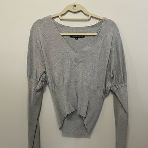 Long sleeve, cropped sweater.